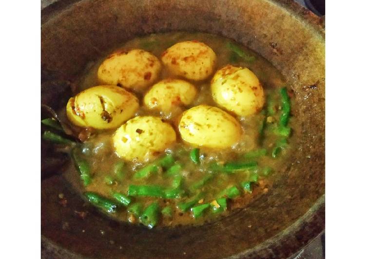 Bagaimana Menyiapkan Telur Bumbu Kuning - simple, Lezat