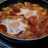 Pisto con huevos y butifarra