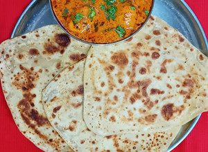 A picture of Dahi Aloo With Paratha.