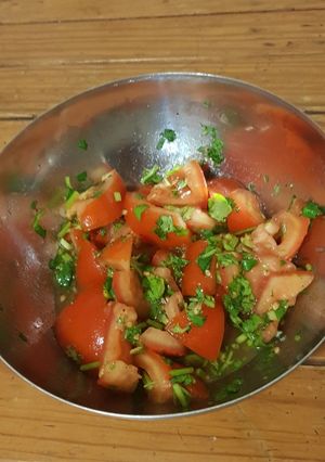 A picture of Refresing tomato salad.