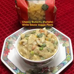 A picture of Cheesy Butterfly (Farfalle) White Sauce Veggie Pasta.