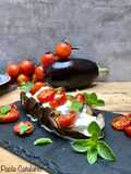 Tagliata di melanzane pomodorini confit e stracciatella pugliese