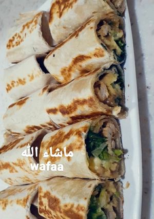 A picture of 9- Chicken Shawarma with Homemade Tortilla Bread.