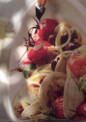 Une photo de Spaghettis aux tomates confites et aux palourdes