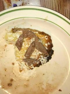Una foto de Tostada de carne y alioli