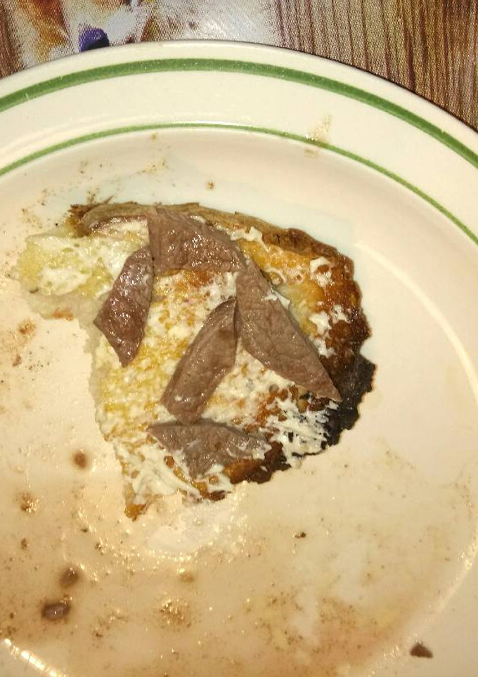 Una foto de Tostada de carne y alioli