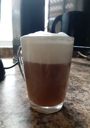 Una foto de Café latte a lo pobre