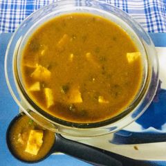 A picture of Choliya-Paneer Curry.