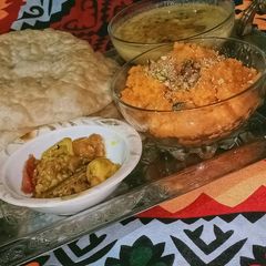 A picture of Halwa poori aloo tarkri.