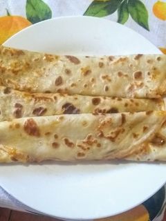 Una foto de Panqueques con manjar (en juguera)