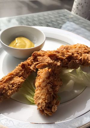 Una foto de Pollo frito con cereal 🇺🇸