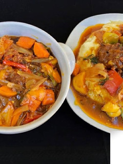 A picture of Silky mashed potatoes with sweet and sour meatballs.