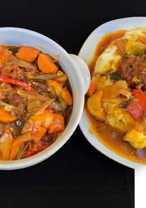 A picture of Silky mashed potatoes with sweet and sour meatballs.