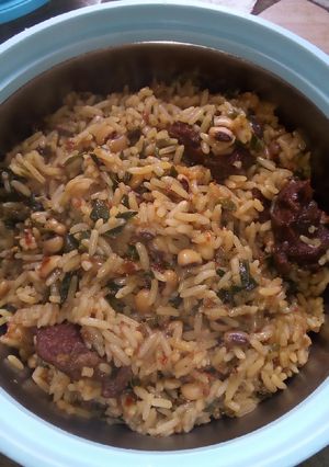 A picture of Moringa jollofrice and beans.