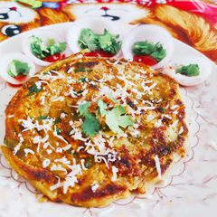 A picture of Cheesy Garlic Lachha Paratha.