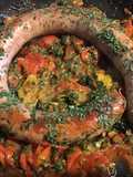 Saucisse à l'ancienne aux trois tomates, ail fumé, oignon de roscoff et romarin frais