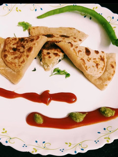 A picture of Cauliflower onion stuffed parathas.