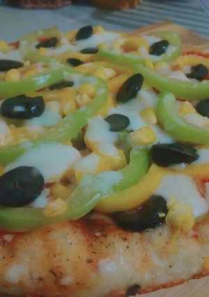 صورة لوصفة بيتزا على الغاز 🍕