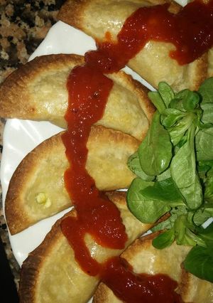 Una foto de Empanadillas de Philadelphia y espárragos trigueros