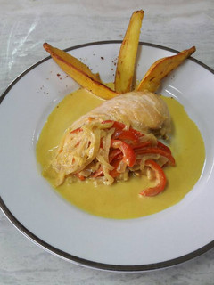 Una foto de Pollo a la crema de cúrcuma