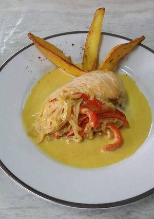 Una foto de Pollo a la crema de cúrcuma