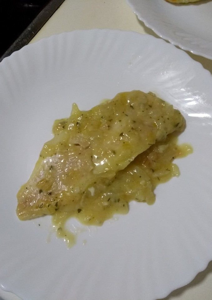 Una foto de Merluza en salsa de cebolla (a mi manera)