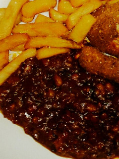 A picture of Tex's Killer Baked Beans in Tomato Sauce 🍲🍅.