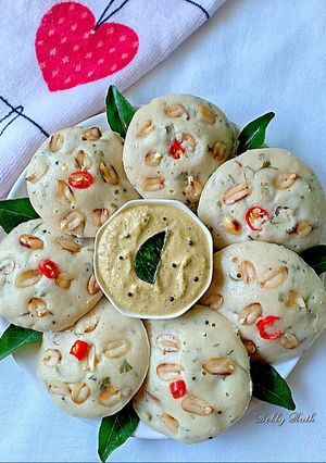 A picture of Roasted peanut millet idli with peanut coconut chutney.