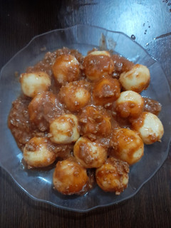 Una foto de Ñoquis rellenos de queso