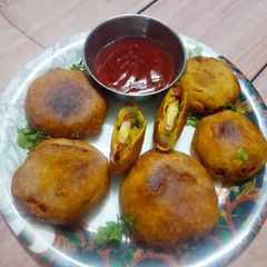 Tomato pakoda A picture of Tomato pakoda.