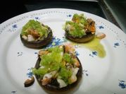 Una foto de mejillones a la plancha