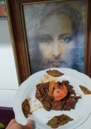 Una foto de Carne con BBQ