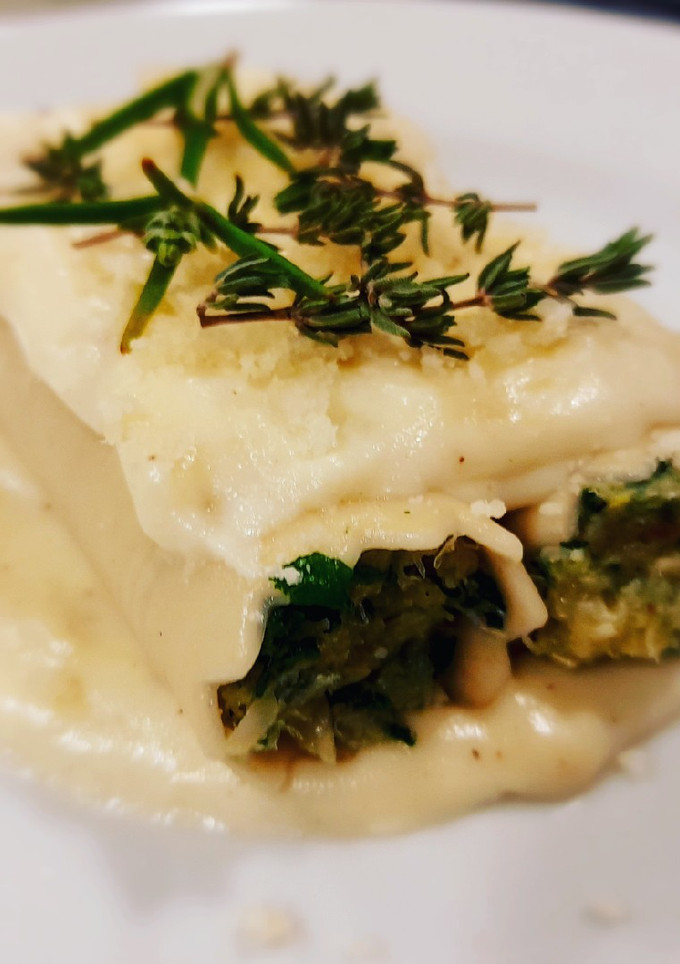 Una foto de Canelones de espinacas y bacalao