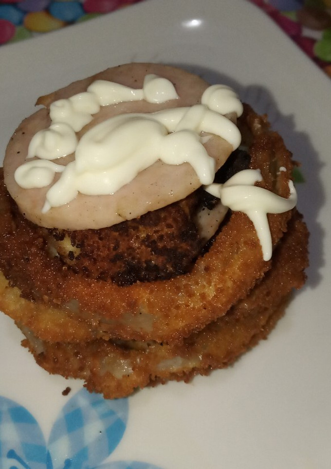 Una foto de Milhoja de cebolla con queso