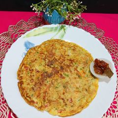 A picture of Healthy Oats Veggies Egg Cheela.