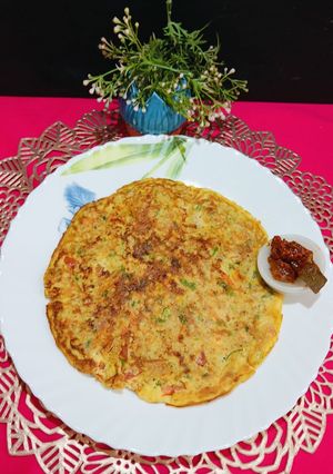 A picture of Healthy Oats Veggies Egg Cheela.