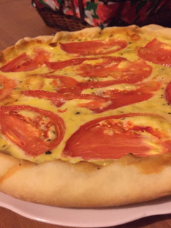 Una foto de Tarta de tomate, cebolla y queso