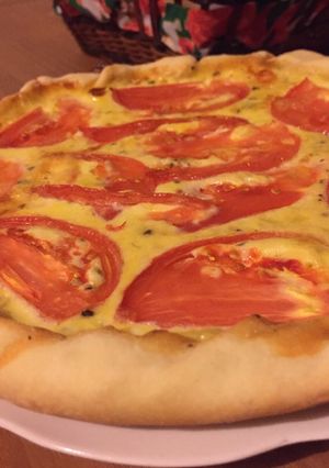 Una foto de Tarta de tomate, cebolla y queso