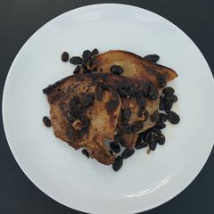 A picture of Pan Roasted Pork Chops with Toasted Raisins.