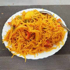 A picture of Vermicelli Upma with Mix Vegetables.