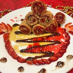 A picture of Seasame strawberry roll.