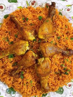 صورة لوصفة رز احمر بافخاذ الدجاج