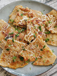Una foto de Pan Naan de Queso y Ajo