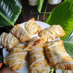 A picture of Apple Cinnamon Pockets with Cream Cheese Icing.