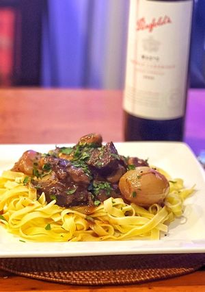 A picture of Beef Bourguignon with Egg Fettuccine.