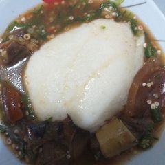 A picture of Semolina with okra soup.