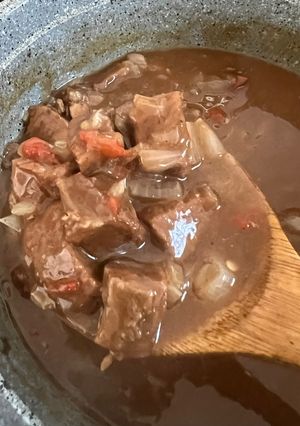 A picture of Beef cubes and rice.