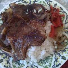 Una foto de Arroz con costilla