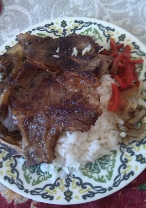 Una foto de Arroz con costilla