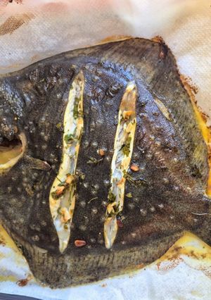 A picture of Roasted Turbot Stuffed with Fresh Herbs and Lemon.